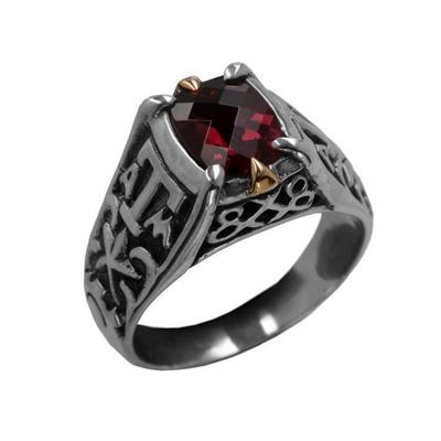 Texas A&M ring in sterling silver with maroon garnet and 18K gold.                                                                                                                                                                                        