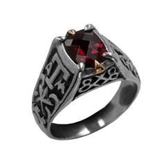 Texas A&M ring in sterling silver with maroon garnet and 18K gold.                                                                                                                                                                                        