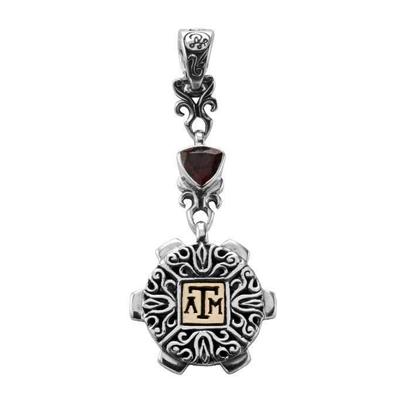 Texas A&M Aggie pendant in sterling silver with gold and maroon garnet.                                                                                                                                                                                   