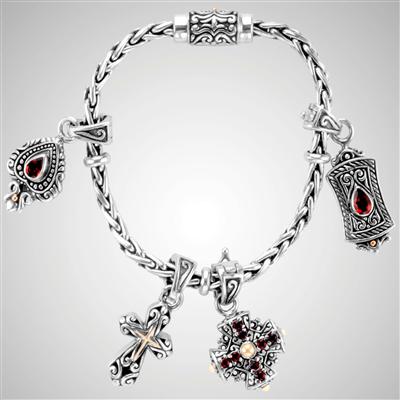 Silver wheat bracelet with garnet charms.                                                                                                                                                                                                                 