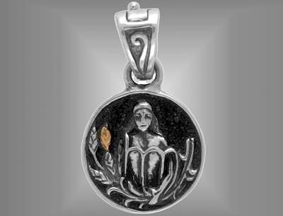 Silver Virgo virgin pendant charm with gold.                                                                                                                                                                                                              