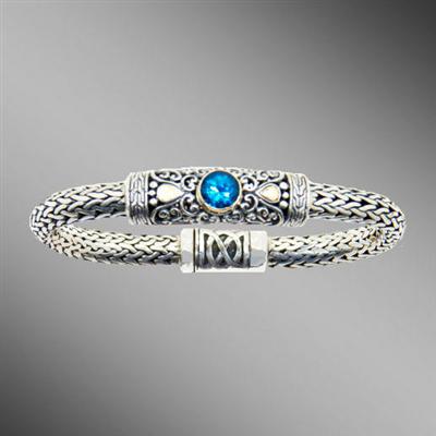 Woven silver bracelet with swiss blue topaz and magnetic clasp.  Arista.                                                                                                                                                                                  