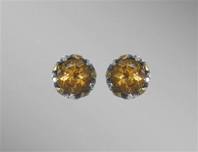 #306. Sterling silver stud earrings with 18K gold accents and blue topaz.                                                                                                                                                                                 