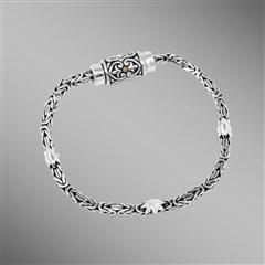 Sterling silver byzantine chain bracelet with magnetic clasp.                                                                                                                                                                                             