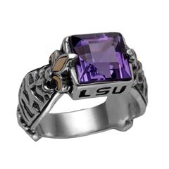 Silver LSU ring with tiger stripes, gold fleur-de-lis and amethyst.                                                                                                                                                                                       