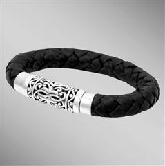 Thick braided leather bracelet with silver magnetic clasp.                                                                                                                                                                                                
