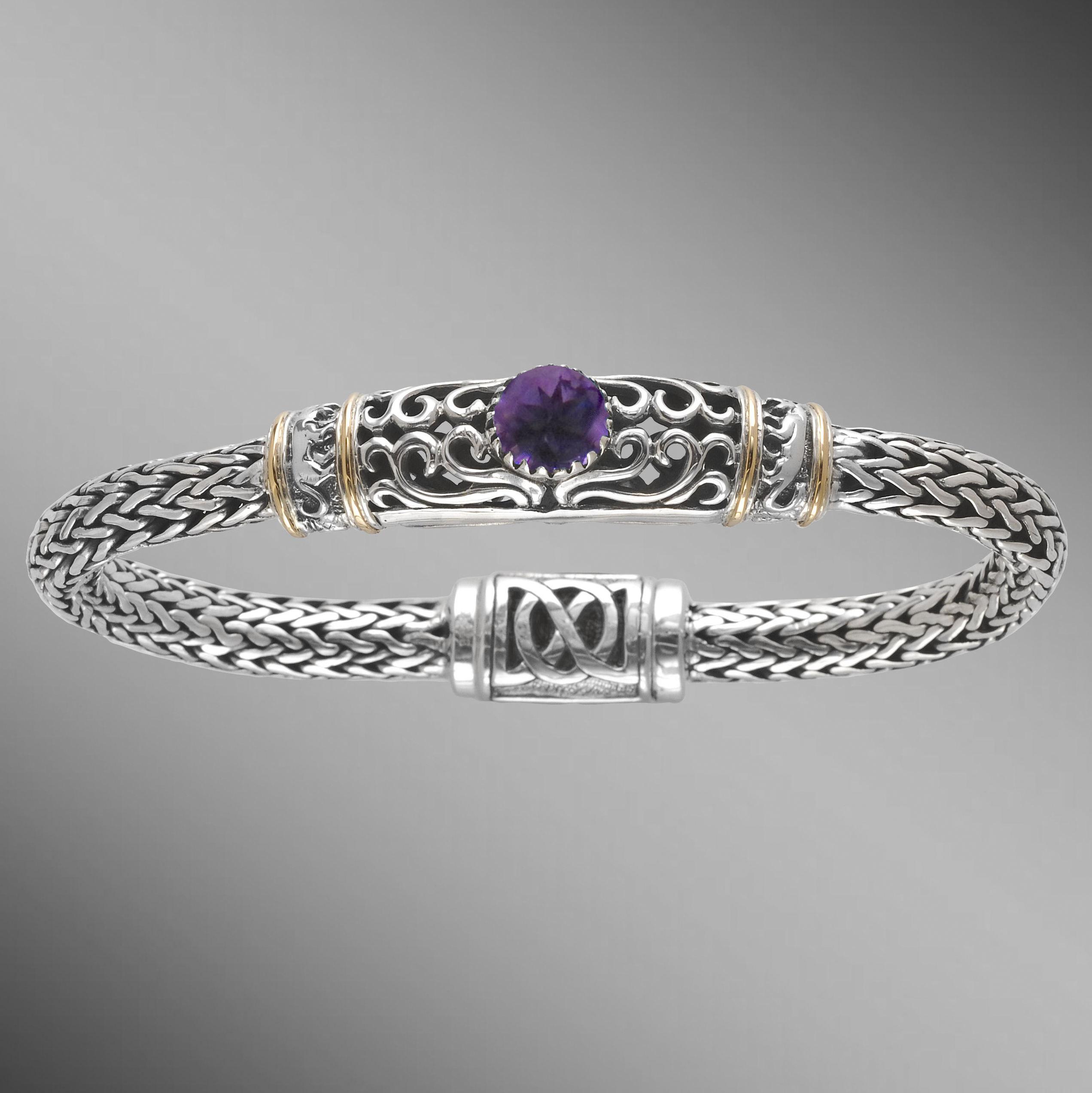 Amethyst woven silver bracelet with creature design.                                                                                                                                                                                                      