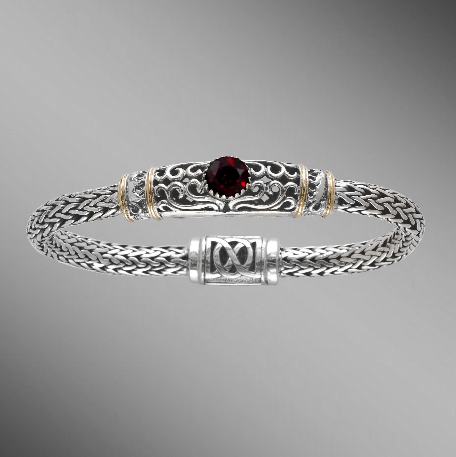 Garnet woven silver bracelet with magnetic clasp.                                                                                                                                                                                                         