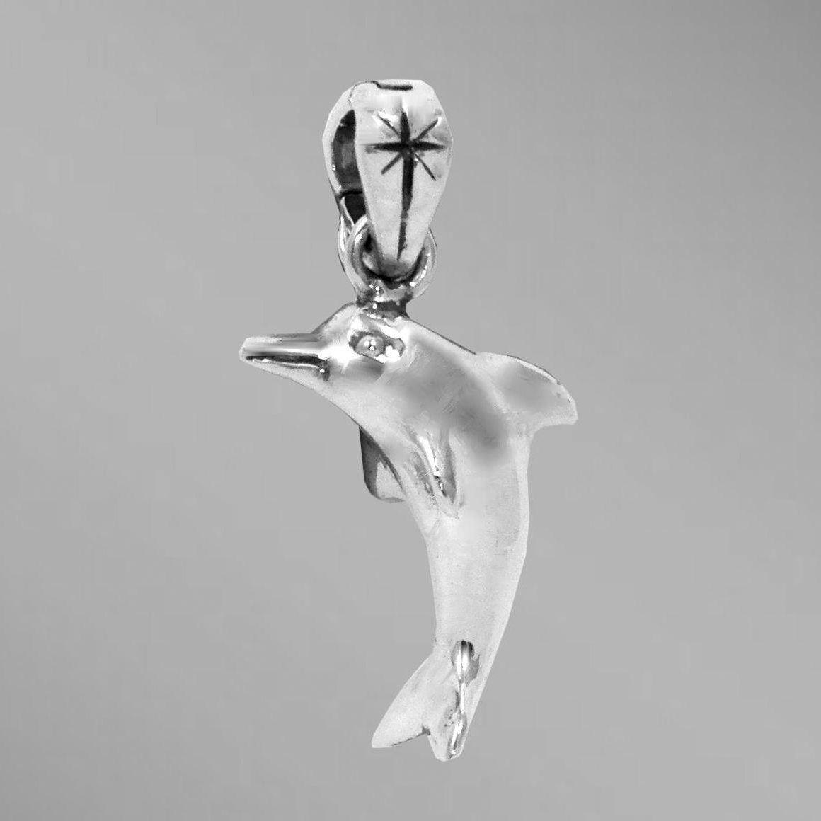 Sterling silver dolphin charm or pendant.                                                                                                                                                                                                                 