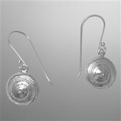 Hypnotic spiral moon shells in sterling silver on hooks.                                                                                                                                                                                                  