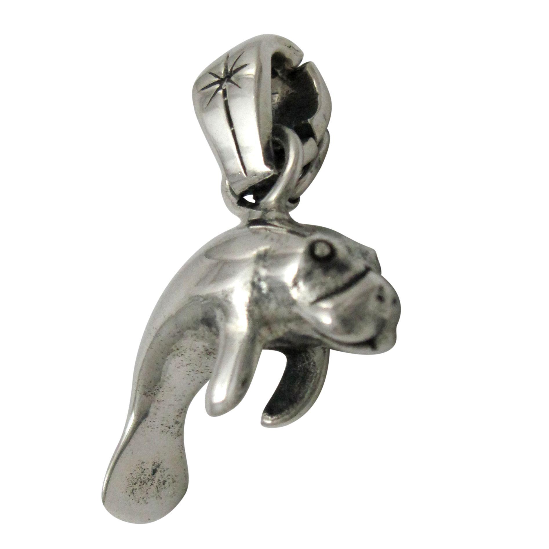 Silver manatee pendant charm.                                                                                                                                                                                                                             