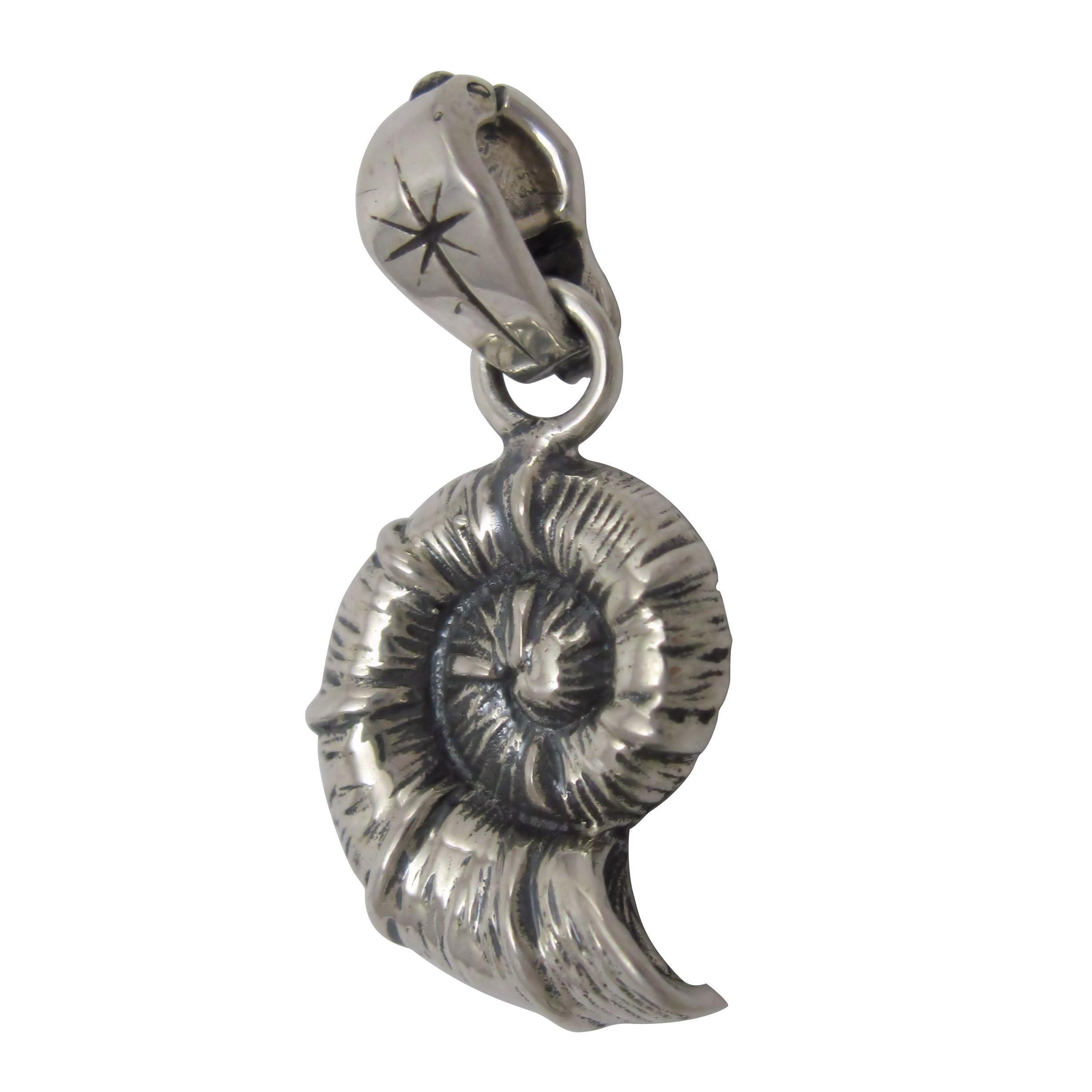 Silver ammonite pendant.                                                                                                                                                                                                                                  