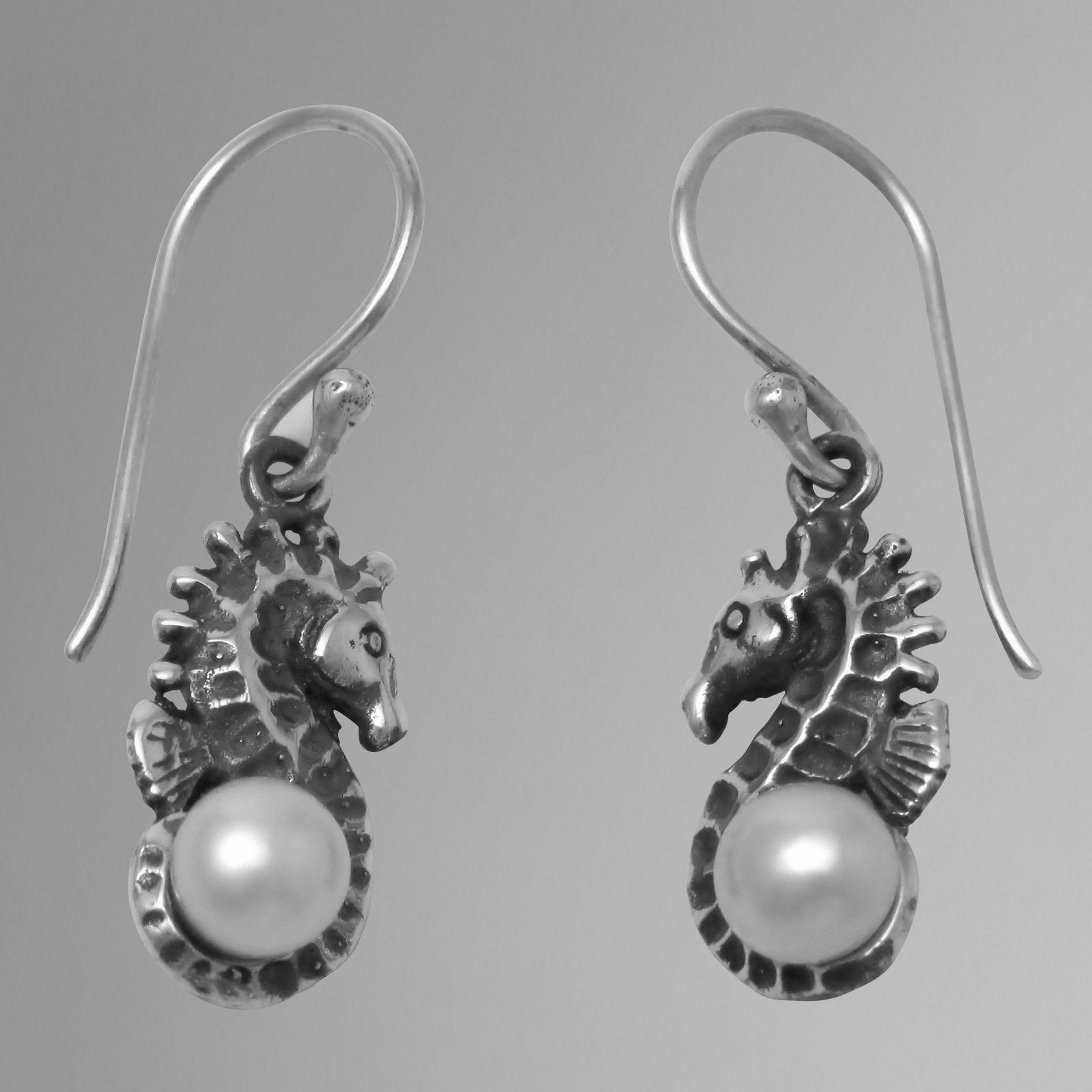 Sterling silver seahorse earrings with pearls.                                                                                                                                                                                                            