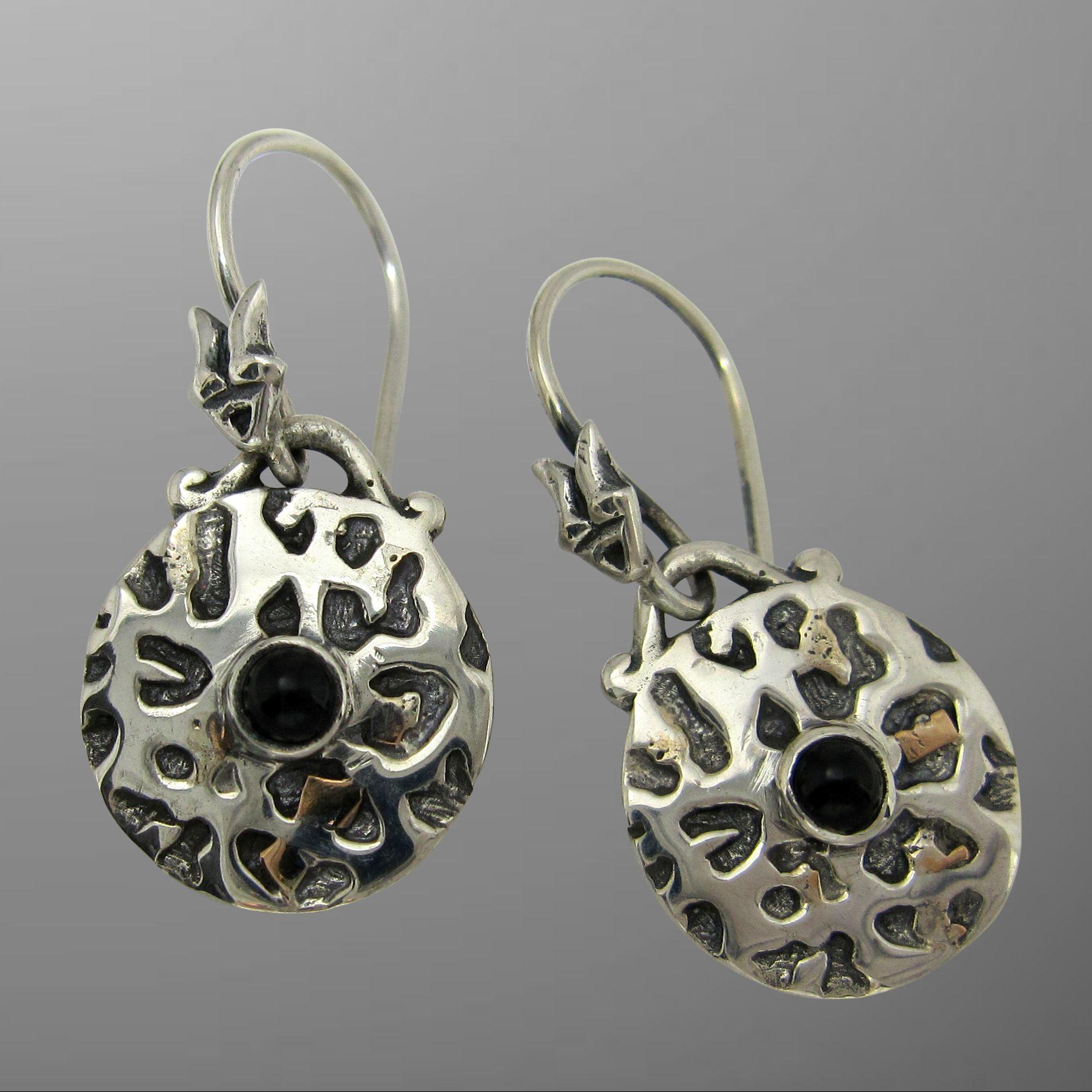 Leopard spot earrings.                                                                                                                                                                                                                                    