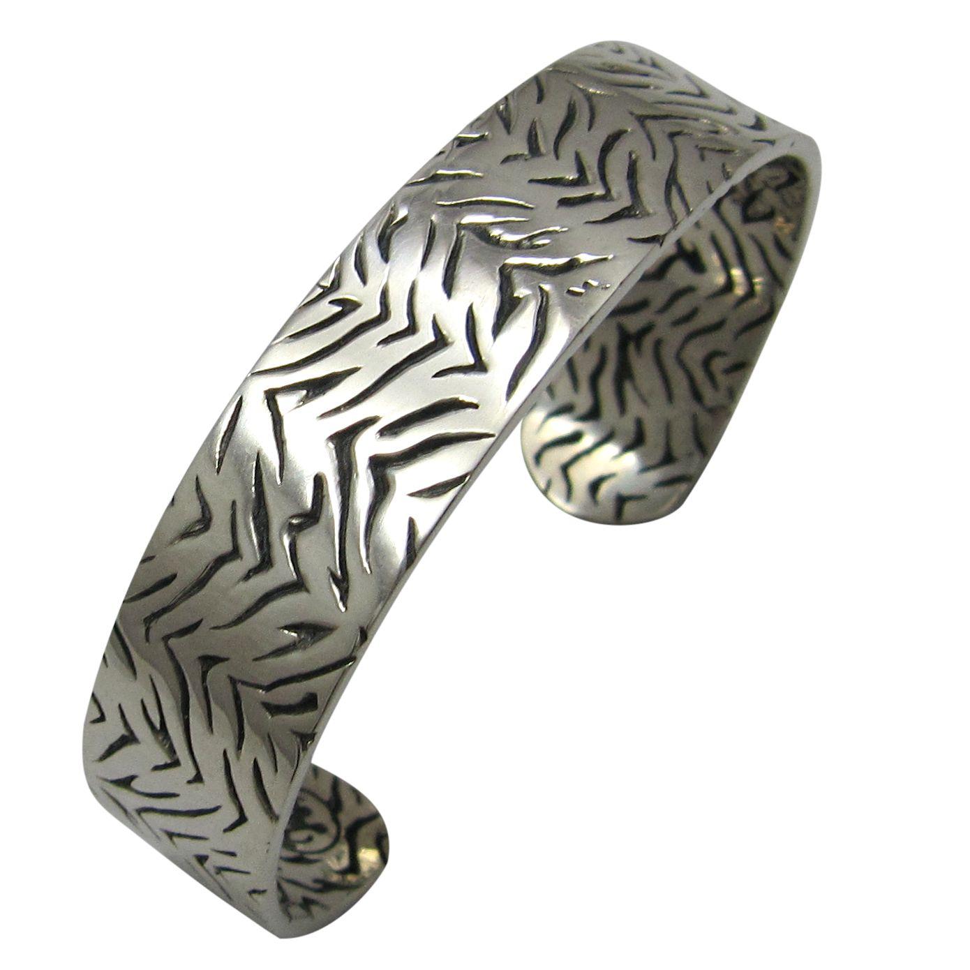 Sterling silver tiger cuff.                                                                                                                                                                                                                               